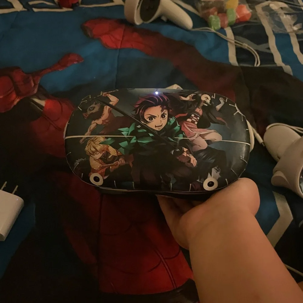 Brand new/ oculus with controllers/demon slayer stickers on oculus